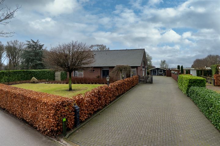 Te koop in Drenthe: landelijk gelegen vrijstaand woonhuis met garage